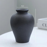Conjunto com 5 Vasos Decorativos Pretos de Formas Orgânicas