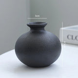 Conjunto com 5 Vasos Decorativos Pretos de Formas Orgânicas
