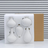 Conjunto com 5 Vasos Decorativos Pretos de Formas Orgânicas